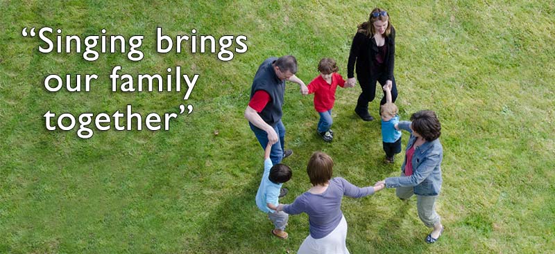 Children playing ring around the rosie