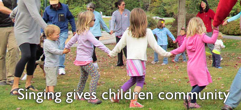 Large group of children singing together