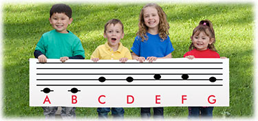 Children holding books and singing together